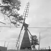 Den smäckra väderkvarnen i byn Fifalla i Ringarum socken. Dokumenterad av Östergötlands museum 1961.