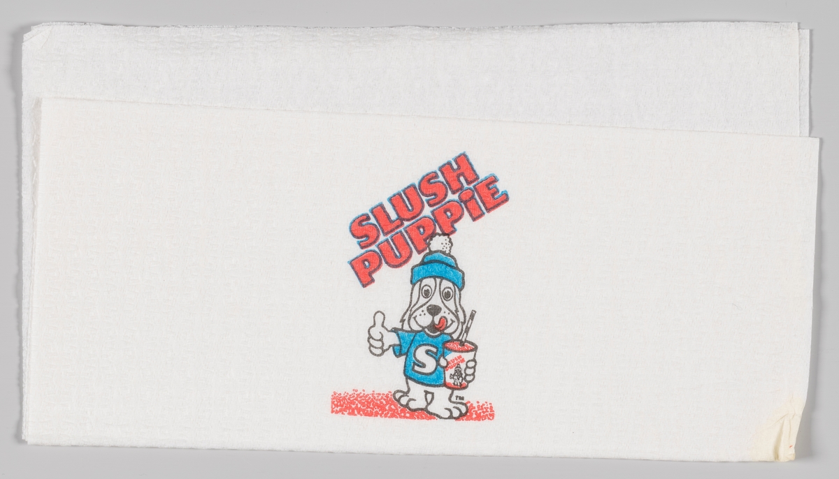 En valp kledt i lue og t-shirt med bokstaven S holder en beholder med Slush og peker med tommelen opp. Reklametekst for Slush Puppie.

Slush Puppie er en leskedrikk som kom på markedet i 1970 i USA. Produktet eies av J & J Snack Foods.
