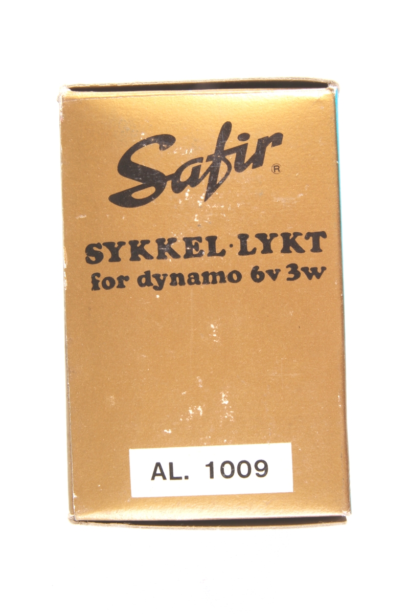 To originalemballasje til sykkellykt. Det er kun den ene som inneholder sykkellykt.