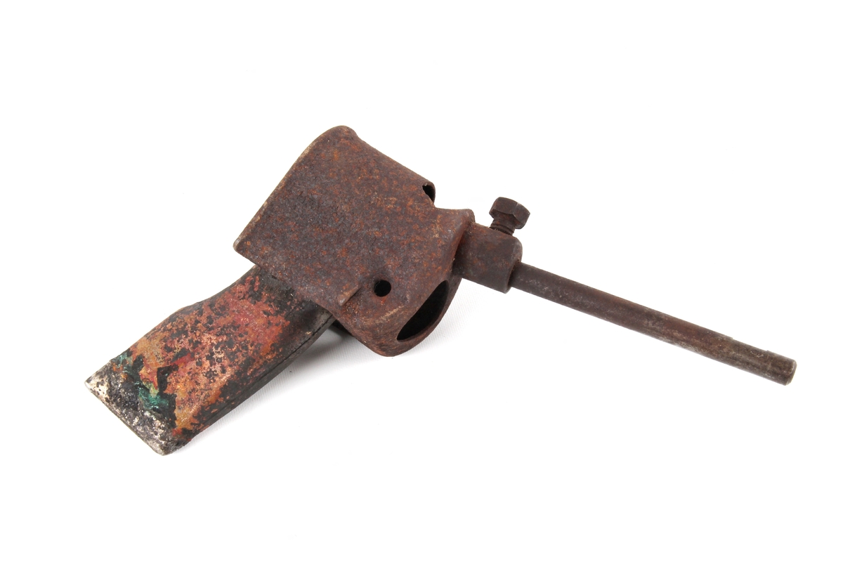Loddebolt hode. Håndtak med varmekilde (trolig elektrisk) mangler.