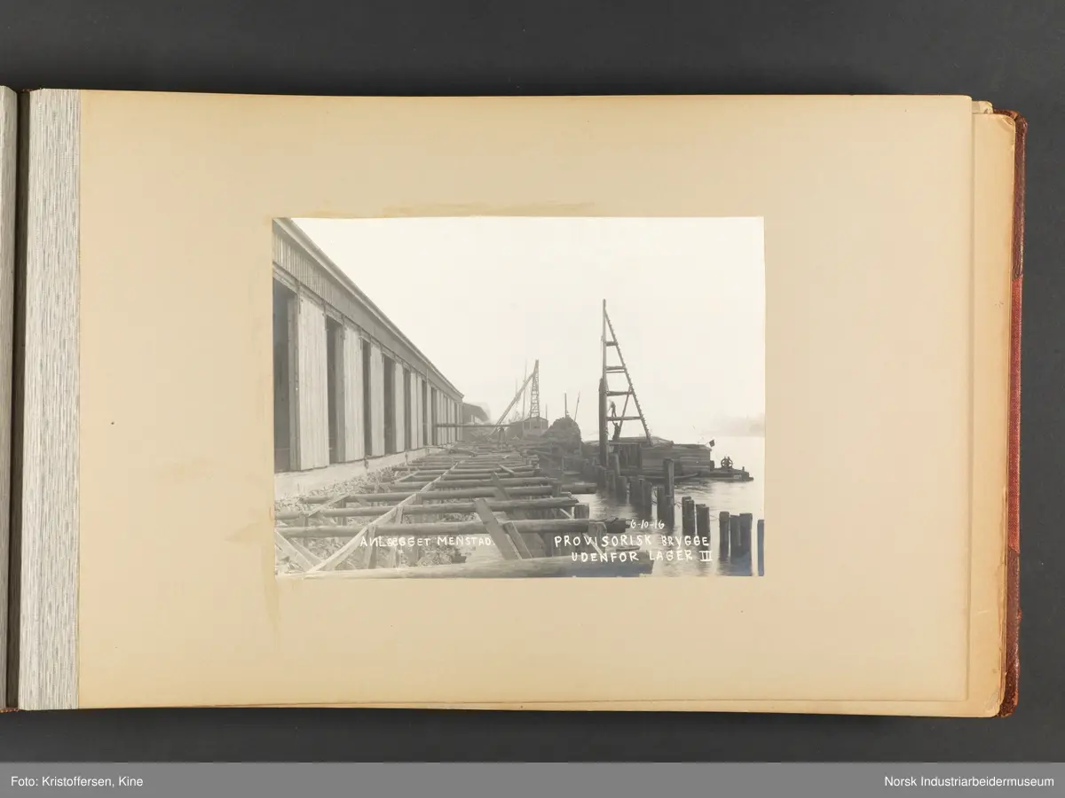 Fotoalbum med 100 sider og 53 innlimte fotografier fra Menstad i Skien