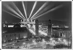 Kvällsbild över en del av utställningsområdet. Världsutställningen i Barcelona 1929.