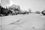 Snöskottning vid Färjestaden station. På spåret står Södra Ölands Järnväg, SÖJ lok 4.