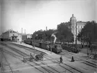 Statens Järnvägar, SJ Oc 386 med persontåg
Centralstationen. Tvåvånings stationshus i sten med mindre banhall. Byggdes liksom Malmö av en dansk arkitekt (gissningsvis C.F Rasmussen.1856-57. Två små envåningsflyglar tillbyggda 1872 .Stationen hade banhall 1856 - 1876. Stationshuset ombyggt 1924,  Stationshuset byggnadsminnesmärke 1972. Godsmagasin i sten. 
Stationen hette 