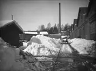 Snö bakom gamla verkstaden