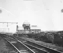 Station anlagd 1902. I samband med banans elektrifiering flyttades stationen till det nybyggda transformatorhuset 1913. Tegel byggnad.