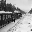 Statens Järnvägar, SJ 100019 Q23. Godsvagn med långt isärdragna balkar och 4800mm bredd. Vikt 100 ton. Transport av stator från ASEA, Västerås till Biskopskulla.