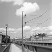 Södra Järnvägsbron, med Riddarholmen och del av Riddarholmshamnen till vänster. Centralbron, Gamla Stan till höger. Riddarhuset i bildens mitt.