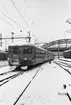 Motorvagnståg Trafikaktiebolaget Grängesberg-Oxelösund Järnvägar TGOJ. Stockholm Centralstation, vinterbild. . Dvärgignalen visar 