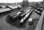 Liljeholmens bangård. Fotot taget från liljeholmsbron.
ODELBERG & OLSON och HAAK:s byggnader i bildens mitt.