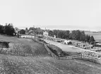 Vy över Storå bangård och stationshus.