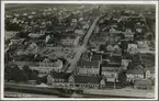 Flygfoto över Hässleholm med stationen i nederkant.