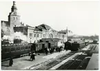 Kristianstads station efter om- och tillbyggnaden 1917. I bakgrunden syns Heliga Trefaldighetskyrkan.