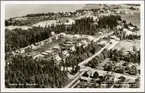 Flygfoto över Borghamn med Vättern i bakgrunden.