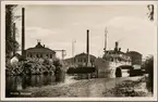 Wilhelm Tham passerar Motala Verkstad i Göta Kanal.