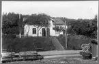 Falerum station. Norsholm - Västervik - Hultsfreds Järnvägar, NVHJ godsvagn 1245.