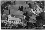 Vy över Skillingmarks kyrka och Skillingsfors järnvägsstation.