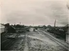 Kristianstad - Hässleholms Järnväg, CHJ Kristianstad godsbangård vid Näsby  (riktning västerut mot staden).ca 1917  längst till vänster BKB  Blekinge kustbanors lokstall färdigt 1916.  Yngve Holmgren 1991-12-11