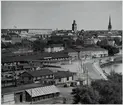 Vy mot slottet och tyska kyrkan, gamla ilgodset i förgrunden.