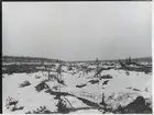 Porjus kraftverk under byggnation vid Stora Lule älv. Stranden före byggandet av stora dammen.