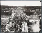 Järnvägsbron byggs över Piteälven vid Sikfors på linjen mellan Piteå och Älvsbyn.