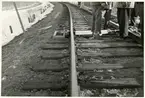 Banarbete efter urspårning av tåg 93, Nordpilen, på sträckan mellan Simeå och Undersvik 1956-03-27.