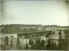 Slind. Statens Järnvägar, SJ. Bro över Skellefte älv i juni 1911.