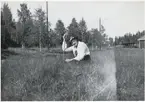 Astrid Andersson. Kolbryggan syns i bakgrunden.