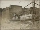 Dubbelspårsbanbyggnad Göteborg - Alingsås. Murning av stenkoner vid Hede vägport, år 1915.