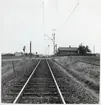 Järnvägsövergång vid Petersborgsvägen på linjen Skytts Vemmerlöv-Trelleborg. Banvaktstuga Petersberg (544).