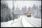 Statens Järnvägar SJ Rc2 1084 med godståg.