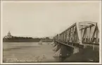 Järnvägsbron över Torneälv mellan Haparanda och Torneå. Till vänster i bild ligger kyrkan i Torneå.