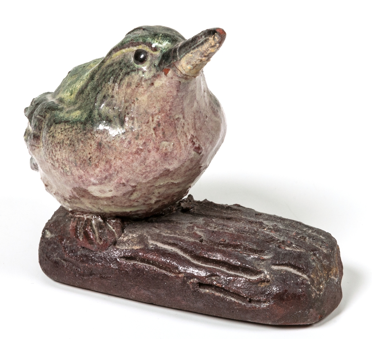 Figurin, fågel på stubbe, glasyr, lergods, formgiven av Märta Willborg, 1937.