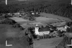 Flygfoto över Åkers kyrka i Vaggeryds kommun, Jönköpings län. Nr 1630/1958