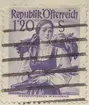 Frimärke ur Gösta Bodmans filatelistiska motivsamling, påbörjad 1950.
Frimärke från Österrike, 1949. Motiv av kvinnodräkt, Wienerwald - Nieder Österreich.