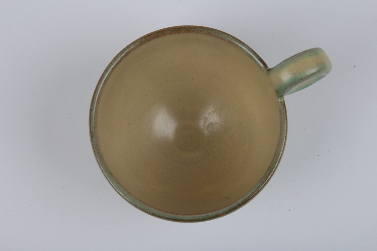 Kaffekopp med dekor.