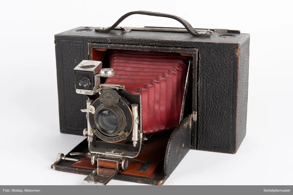 Kombinert apparat for plater og rullefilm