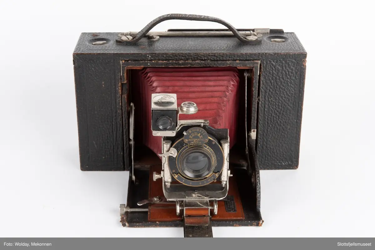 Kombinert apparat for plater og rullefilm