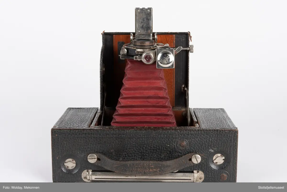 Kombinert apparat for plater og rullefilm