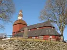 Exteriör, klockstapeln vid Habo kyrka i Habo kommun.