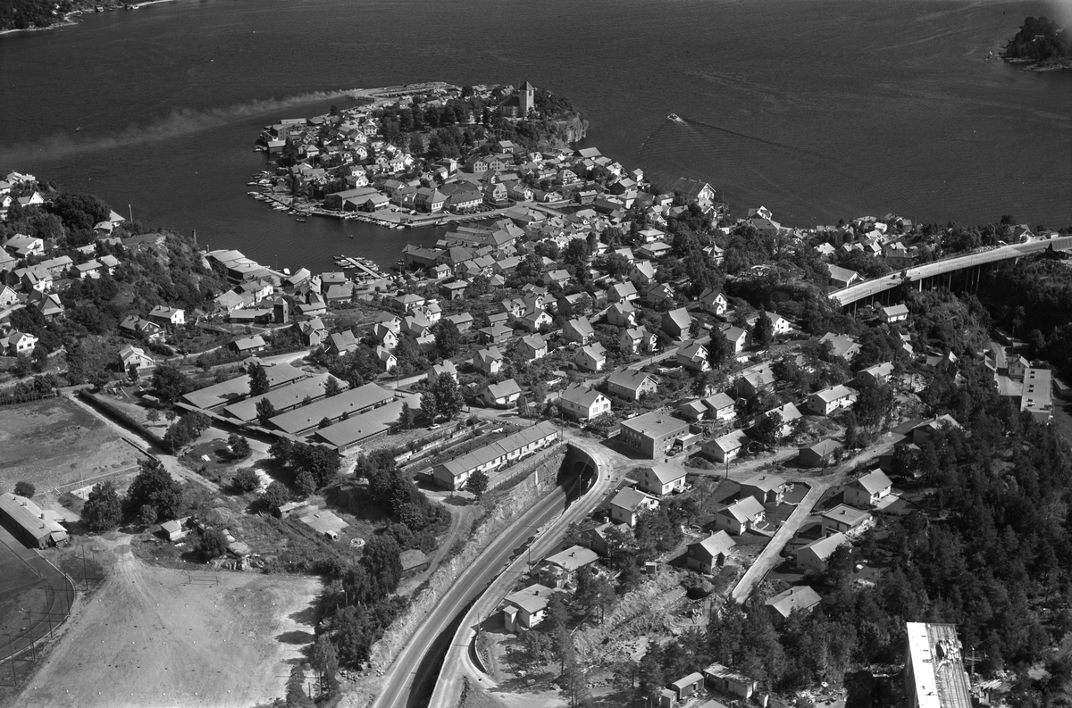 Flyfotoarkiv fra Fjellanger Widerøe AS, fra Porsgrunn Kommune. Brevik . Fotografert av Edmond Jaquet 27.07.1963.