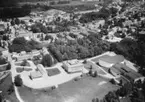 Flygfoto över Värnamo, i förgrunden på höger sida ser man Värnamo idrottshus. Nr: 291/1961