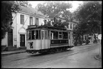 Trondheim Spårväg, TS spårvagn 34 på Sankt Olavs Gate i Trondheim. Den trafikerar linje 2 på sträckan Jernbanen - Lademoen. Bilden är tagen 1949-08-03.