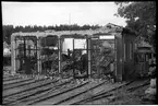 Ödeläggelse av vagnhall och fordon efter branden på Aga industriområde 1949-09-19, i Lidingö.