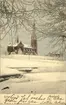 Vykort med vintermotiv över Gustav Adolfs kyrka.