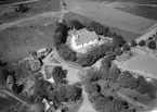 Flygfoto över Forseums kyrka i Nässjö kommun. Jönköpings län. Nr 1051/1961