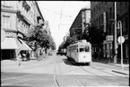 På Norrtullsgatan vid Odenplan ses Aktiebolaget Stockholms Spårvägar, SS A4 30 