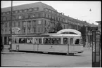 Stadt Karlsruhe spårvagn 121, linje 7 i trafik utanför Karlsruhe centralstation.