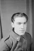 Porträttfoto av soldat Per Erik Oskar Lidström (nummer 876), mekaniker vid F 19, Svenska frivilligkåren i Finland under finska vinterkriget, 1940.