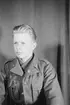 Porträttfoto av soldat John Ingvar Jonsson (nummer 8913), mekaniker vid F 19, Svenska frivilligkåren i Finland under finska vinterkriget, 1940.